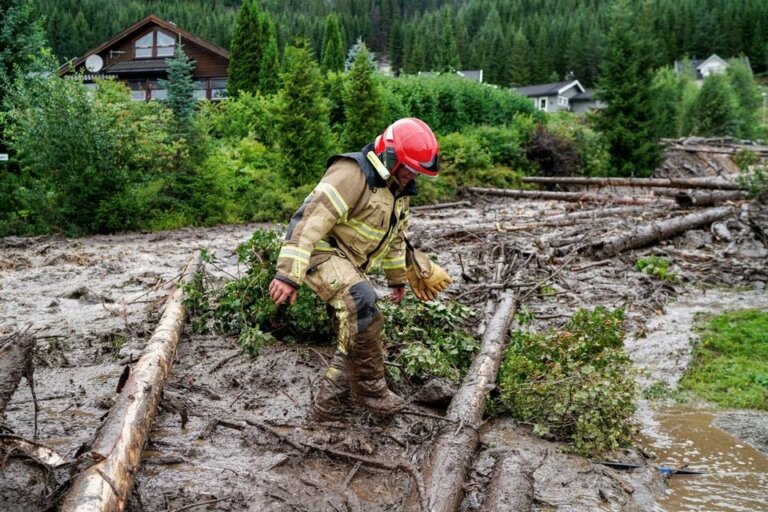 Mud and fallen trees after extreme weather Hans hit Valdres, near Oslo, Norway, August 8. NTB/Cornelius Poppe