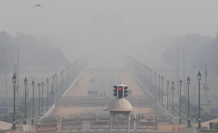 People walk near India Gate on a smoggy afternoon in New Delhi People walk near India Gate on a smoggy afternoon in New Delhi, India, November 15, 2020. REUTERS/Adnan Abidi/File Photo
