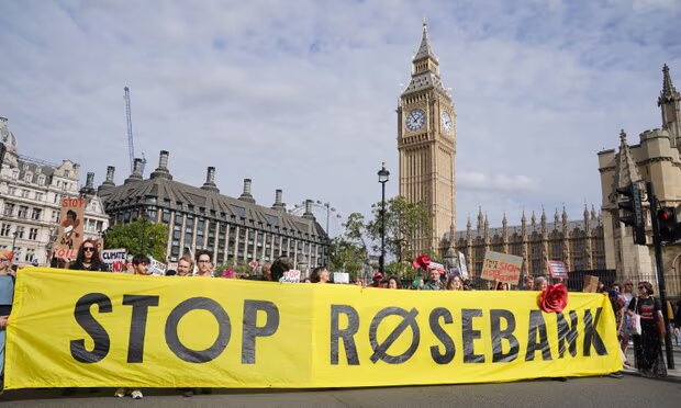 Protesters demonstrate against the British government’s approval of the Rosebank oil field’s development. Photograph: Lucy North/PA
