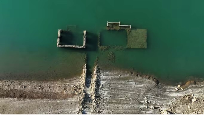 Sunken Greek village emerges after being submerged for 45 years as lake dries up